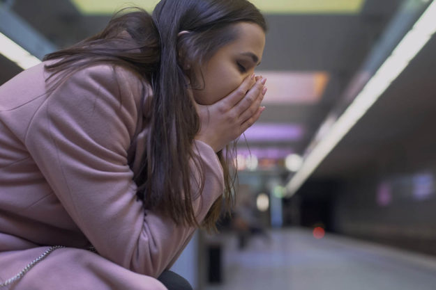 a woman suffers from anxiety and addiction