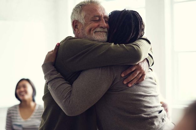 two people are happy to be in a residential treatment program