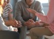 people engaged in group therapy for addiction recovery